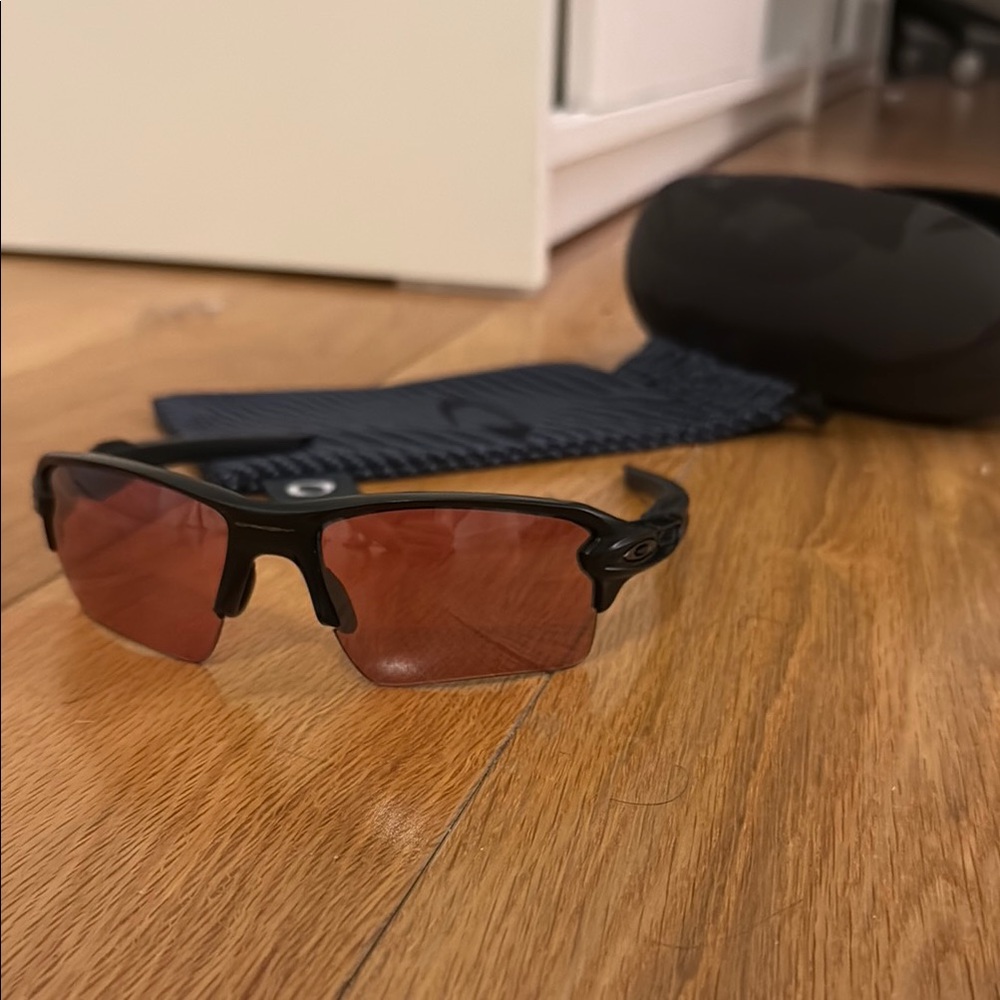 Oakley Black Sunglasses with Red Lenses